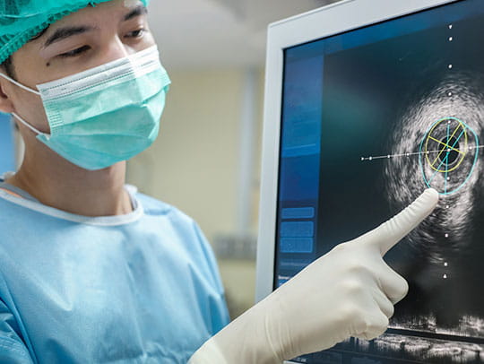 Doctor looking at X-ray