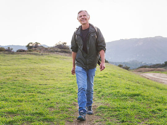 Man walking on a hill