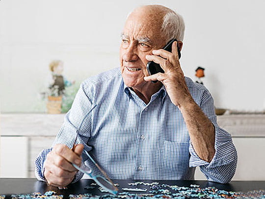 Older man on phone