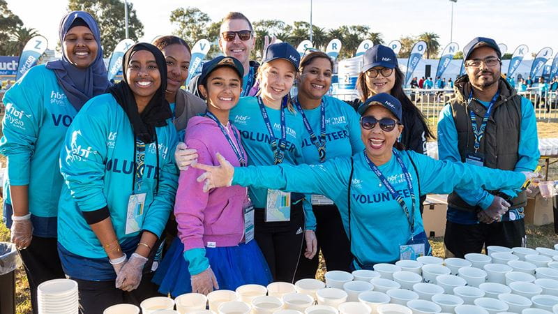 Smiling HBF Run for a Reason volunteers