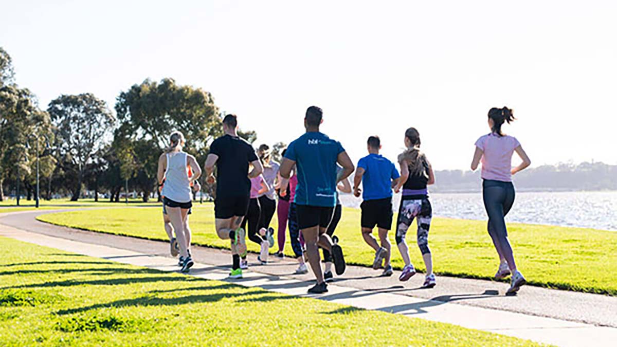Group of people jogging in the park
