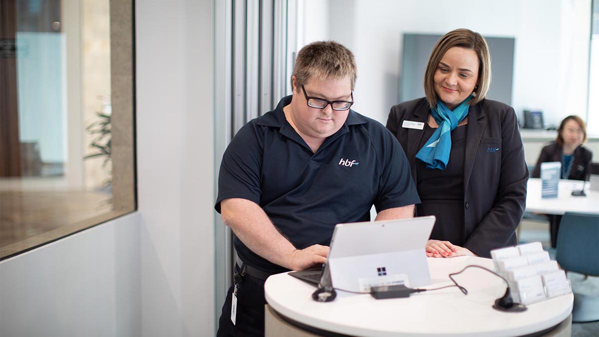 HBF employees at front desk