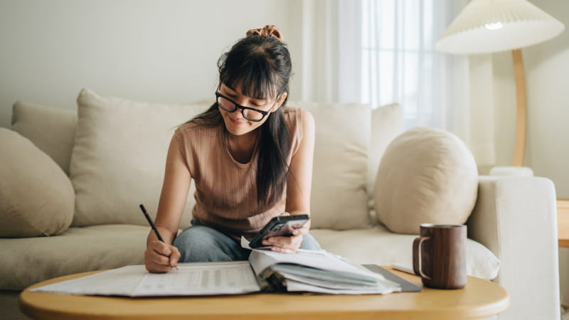 Woman checking her bills