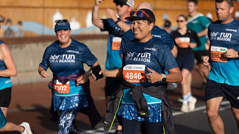 Participants running and smiling