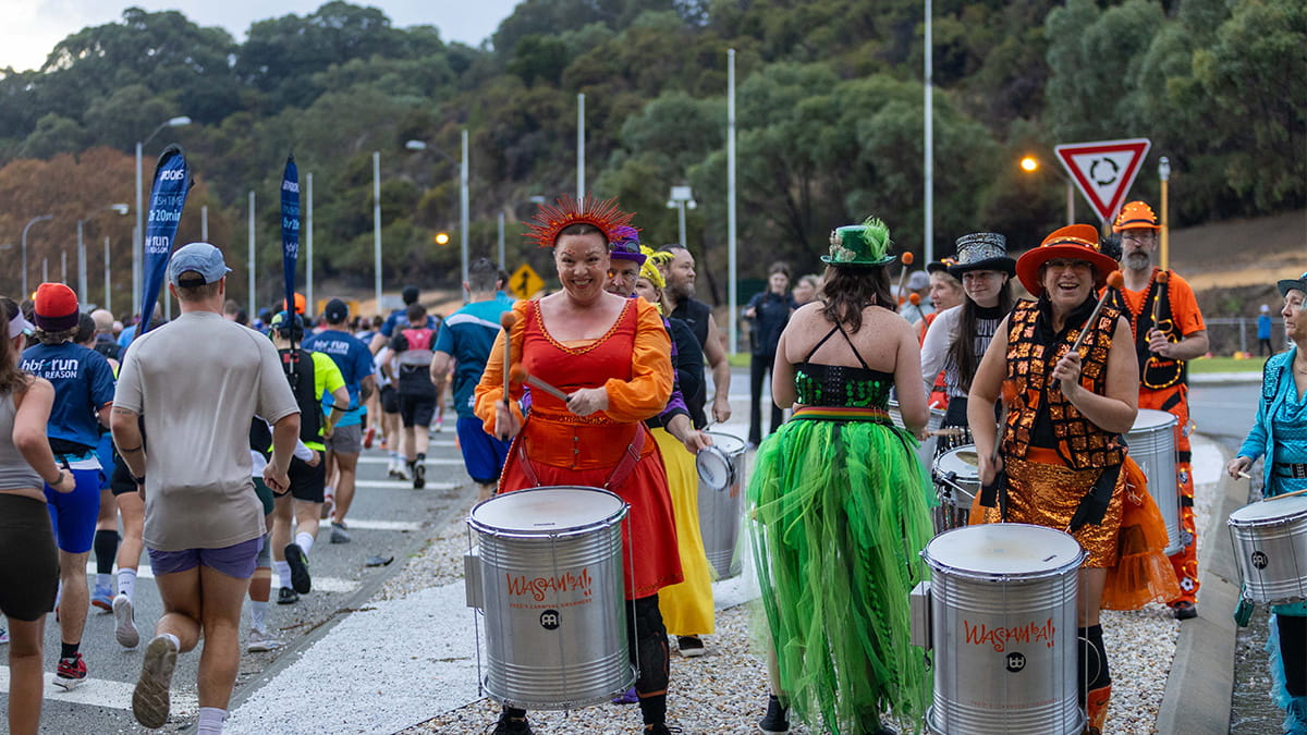 Entertainers playing music for participants