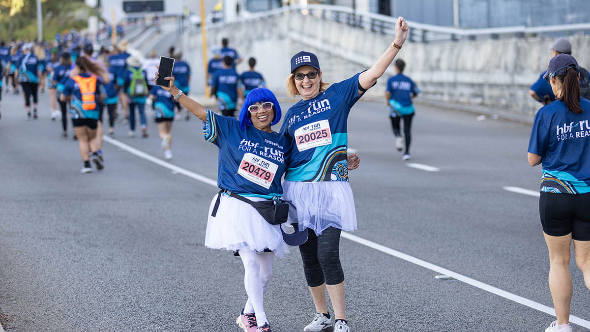 Two women wearing tutus competing in HBF Run for a Reason