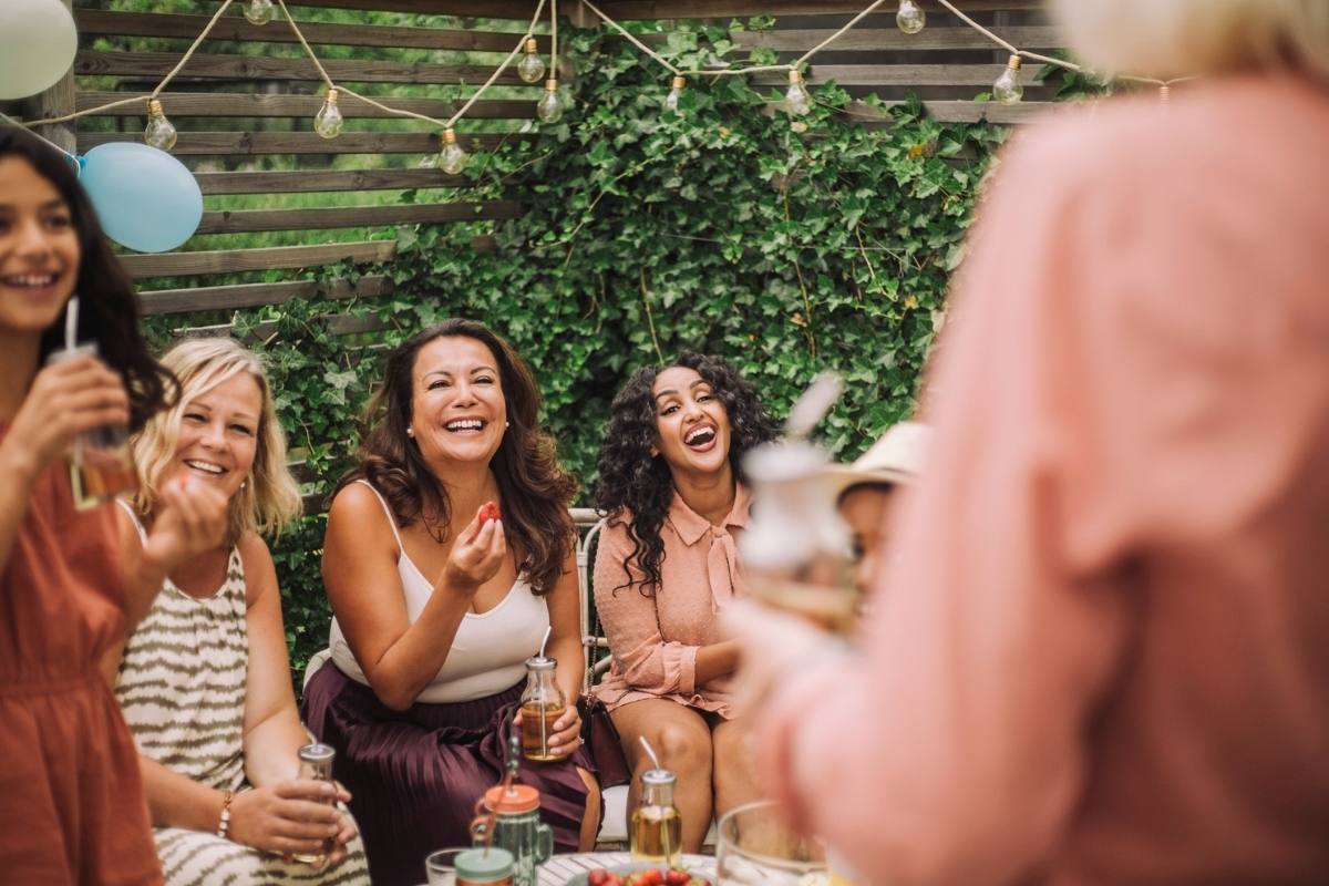 Women laughing at garden party