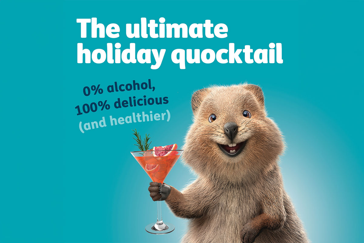 HBF Quokka holding mocktail with strawberries