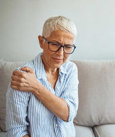 Woman with signs that she may need rotator cuff surgery