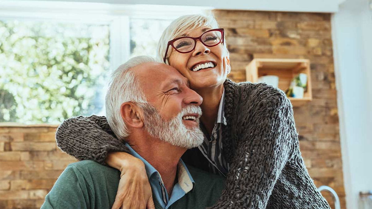 Elderly couple smiling