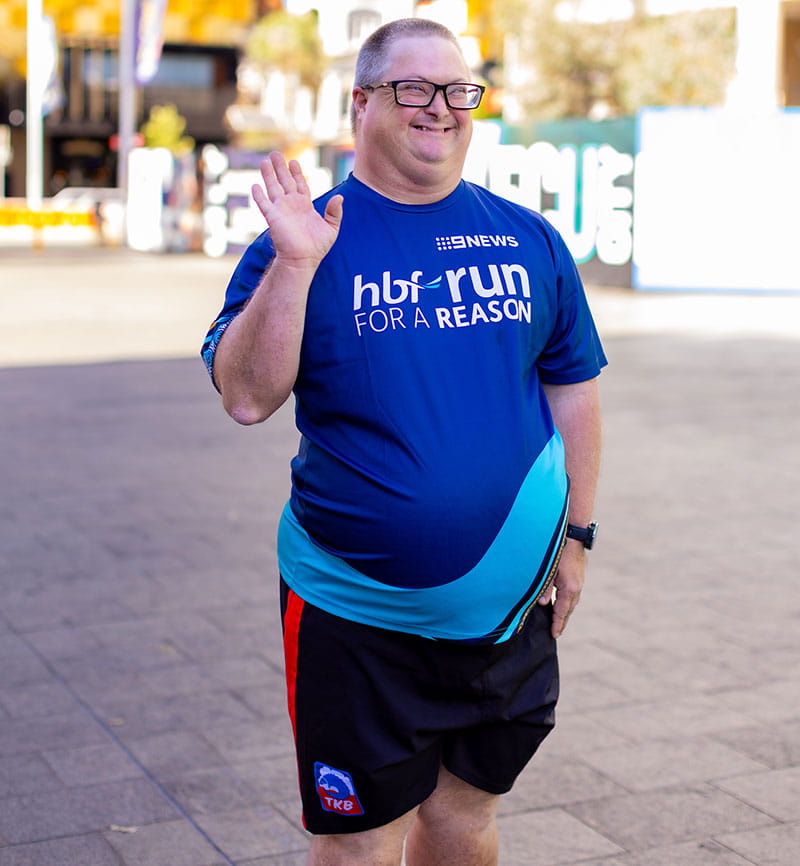 Man wearing 2024 HBF Run for a Reason t-shirt