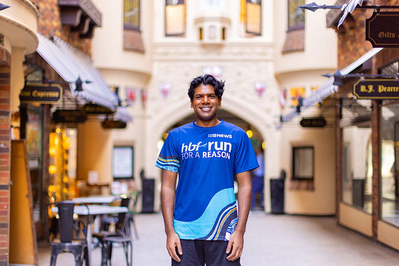 Man wearing 2024 HBF Run for a Reason t-shirt