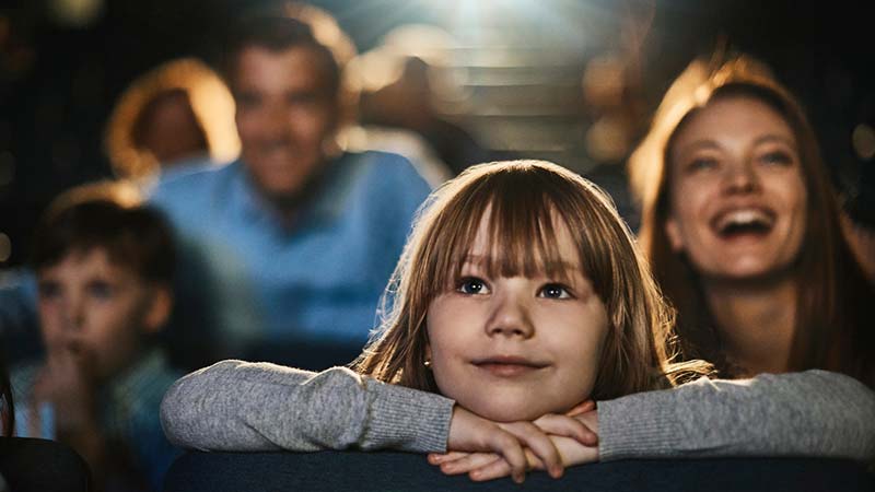 Little girl at cinema