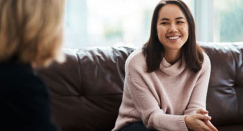 Woman speaking to councellor